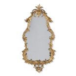 A GEORGE III CARVED GILTWOOD MIRROR, CIRCA 1765