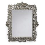 A LARGE ITALIAN SILVERED WOOD AND FOLIATE CARVED MIRROR, MID 18TH CENTURY