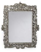 A LARGE ITALIAN SILVERED WOOD AND FOLIATE CARVED MIRROR, MID 18TH CENTURY