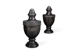 A PAIR OF LARGE BLACK GRANITE URNS, 20TH CENTURY