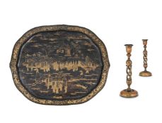 λ A PAIR OF KASHMIRI POLYCHROME DECORATED PAPIER MACHE CANDLESTICKS, TOGETHER WITH A JAPANNED TRAY