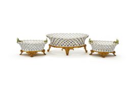A SET OF THREE PORCELAIN TABLE BASKETS