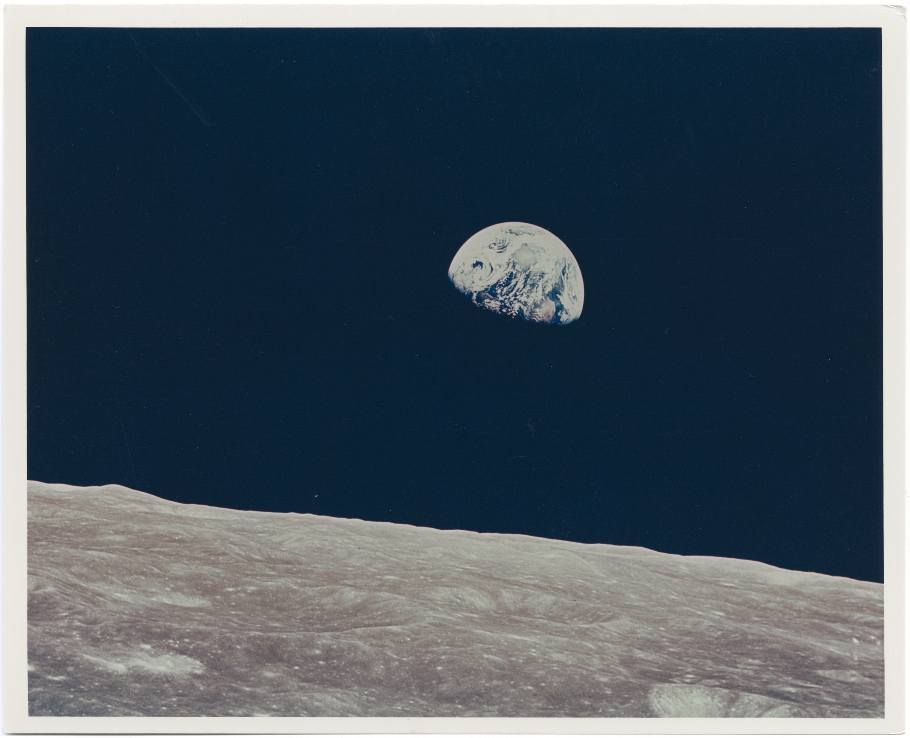 [Apollo 8] EARTHRISE: THE ICONIC FIRST COLOUR PHOTOGRAPH OF EARTHRISE OBSERVED BY HUMANS