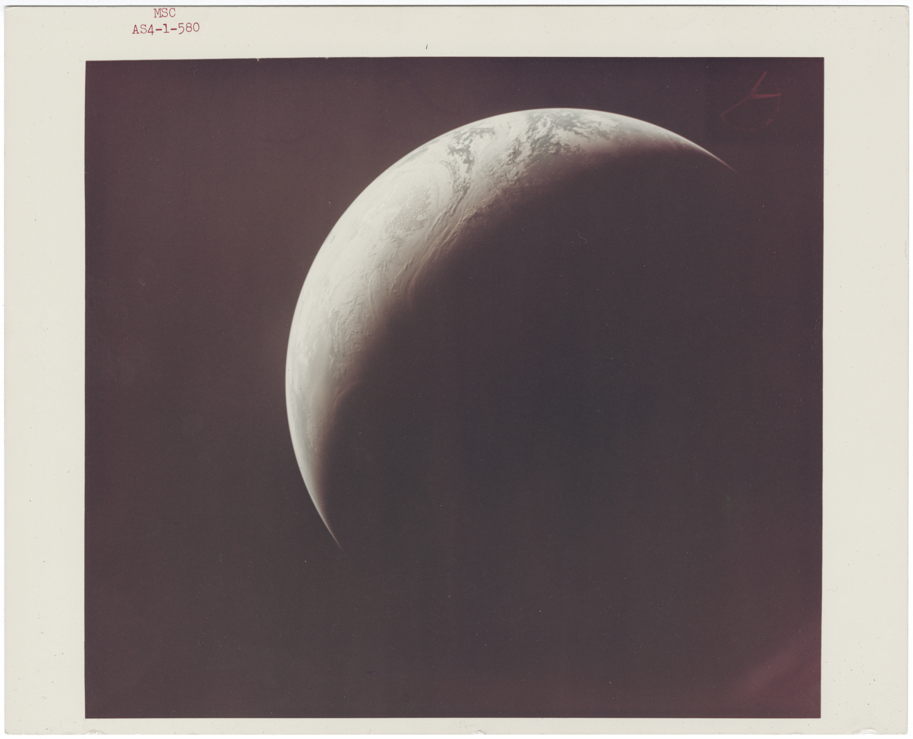 [Apollo 4] FIRST COLOUR VIEW OF EARTH’S FULL CRESCENT, TAKEN FROM NASA’S FIRST SATURN V
