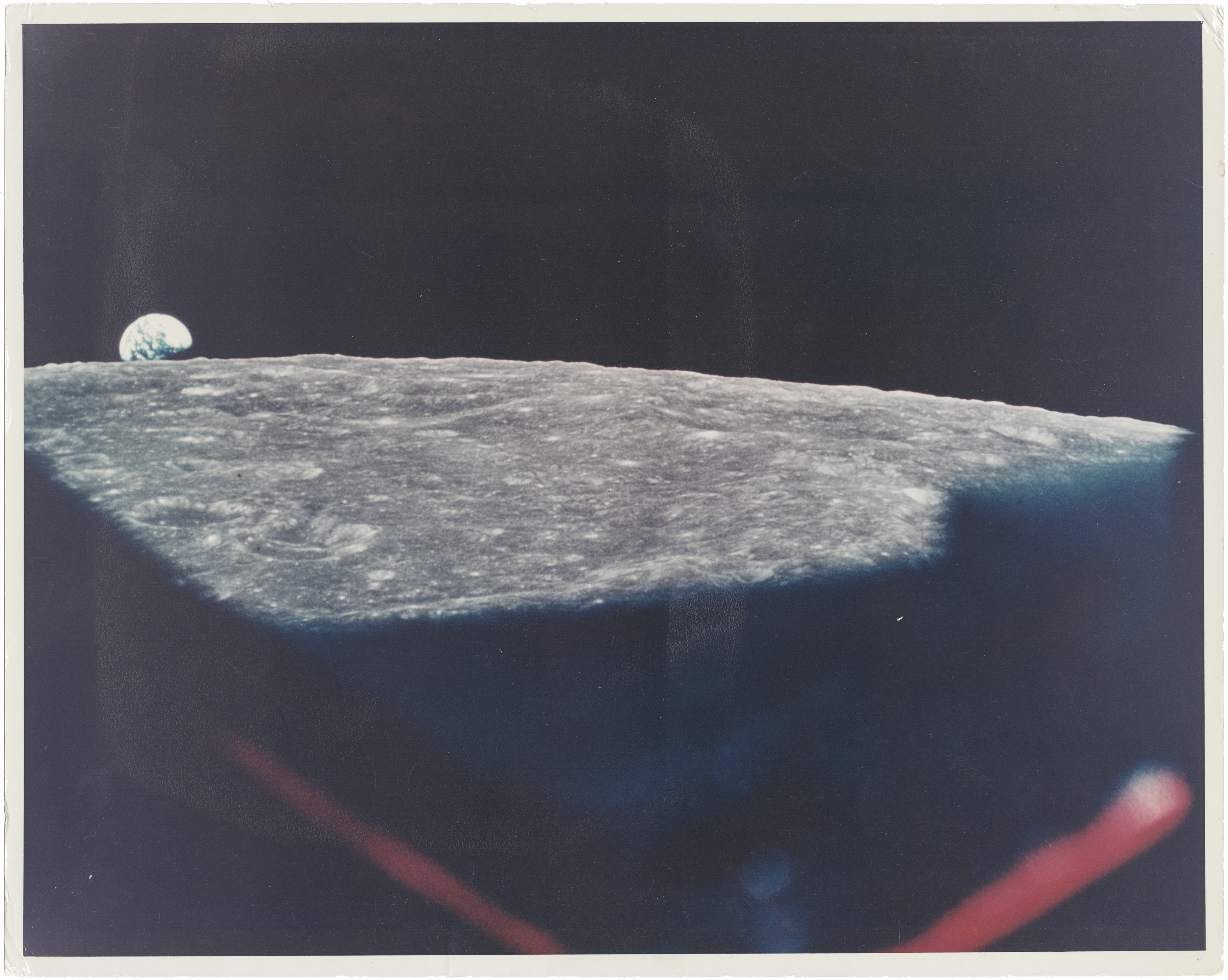 [Apollo 8] LARGE FORMAT: MAJESTIC EARTHRISE SEEN THROUGH THE SPACECRAFT WINDOW