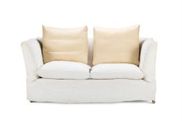 A LATE VICTORIAN DOUBLE DROP END SOFA, CIRCA 1900