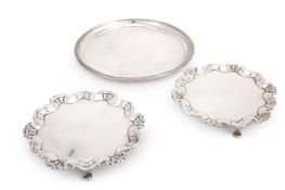 A PAIR OF GEORGIAN SILVER SHAPED CIRCULAR WAITERS