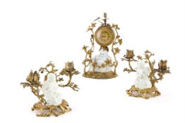 A FRENCH BLANC DE CHINE AND ORMOLU TIMEPIECE GARNITURE, 19TH CENTURY