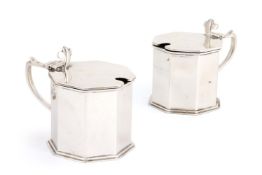 A PAIR OF SILVER BRITANNIA STANDARD OCTAGONAL MUSTARD POTS