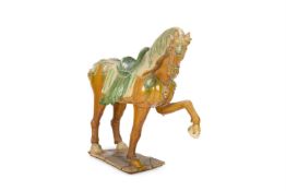 A TANG-STYLE POTTERY HORSE, 20TH CENTURY