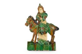 A LARGE RIDGE TILE FIGURE, LATE MING DYNASTY