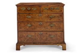 A GEORGE I BURR WALNUT CHEST, CIRCA 1720
