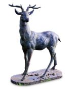 A PAINTED METAL FIGURE OF A STANDING STAG, 20TH CENTURY