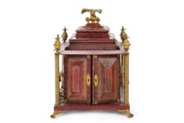 A LATE REGENCY GILT METAL MOUNTED TOOLED LEATHER TABLE CABINET, CIRCA 1820-1840