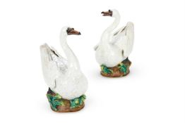 A PAIR OF MEISSEN (OUTSIDE DECORATED) MODELS OF SWANS AFTER THE ORIGINALS, BY J.J. KANDLER