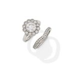 A DIAMOND CLUSTER RING AND BAND RING