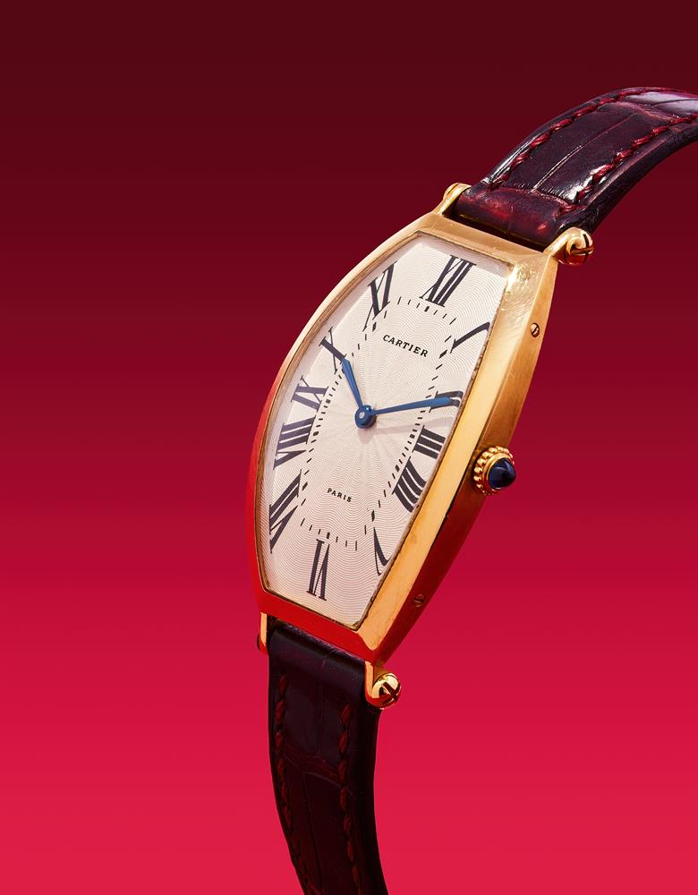 CARTIER, TONNEAU, A GOLD WRISTWATCH