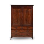 Y A GEORGE III MAHOGANY AND ROSEWOOD BANDED CLOTHES PRESS, ATTRIBUTED TO GILLOWS, CIRCA 1780