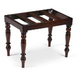 A GEORGE IV MAHOGANY LUGGAGE STAND, IN THE MANNER OF GILLOWS, CIRCA 1825