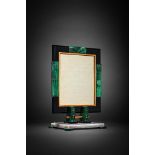 OSTERTAG (PARIS), AN ART DECO MALACHITE, ONYX AND ENAMEL PICTURE FRAME, CIRCA 1934
