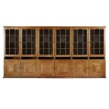 PETER WAALS (DUTCH/BRITISH, 1870-1937), TRIPLE CREDENZA BOOKCASE; 1920s