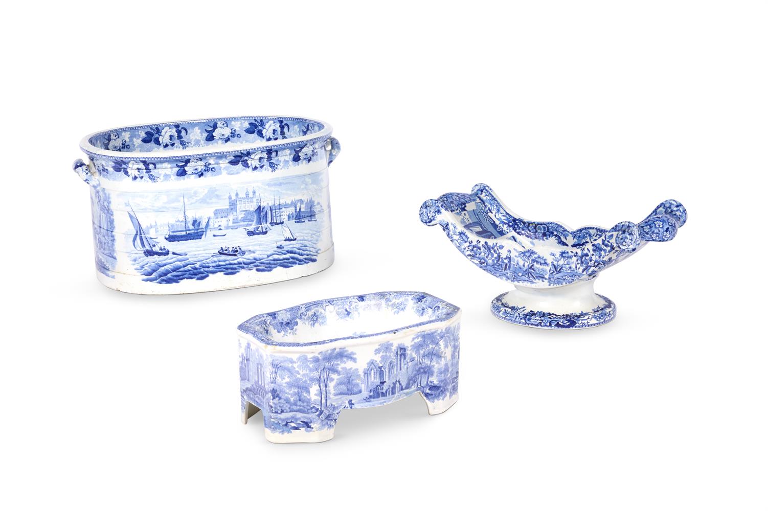 A STAFFORDSHIRE BLUE AND WHITE 'TOWER' PRINTED POTTERY FOOTBATH, FIRST HALF 19TH CENTURY