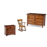 A FIGURED WALNUT MINIATURE COMMODE, CONTINENTAL, 19TH CENTURY