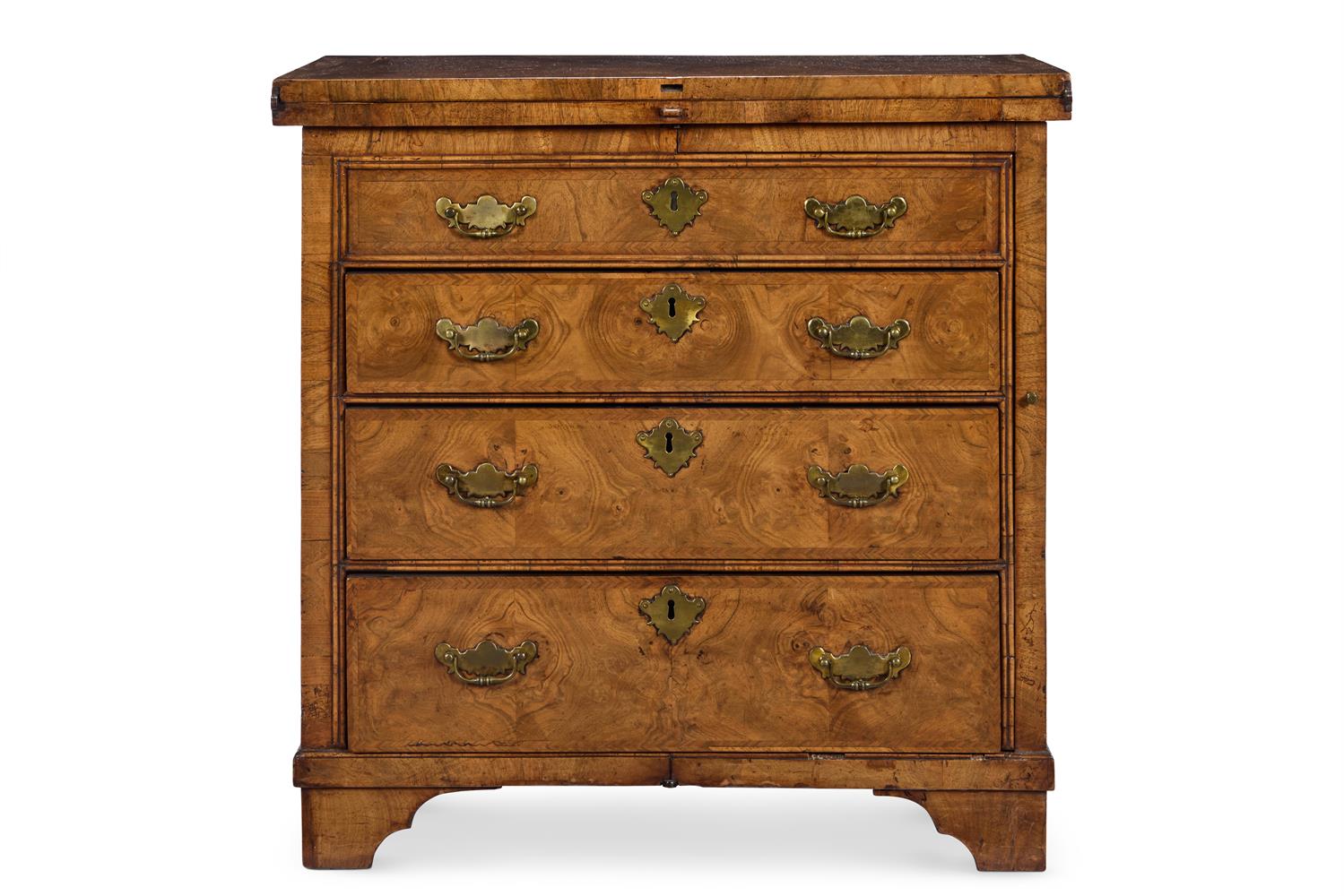 A GEORGE II WALNUT BACHELOR'S CHEST, CIRCA 1730