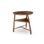 A PRIMITIVE FRUITWOOD AND BEECH CRICKET TABLE, 19TH CENTURY