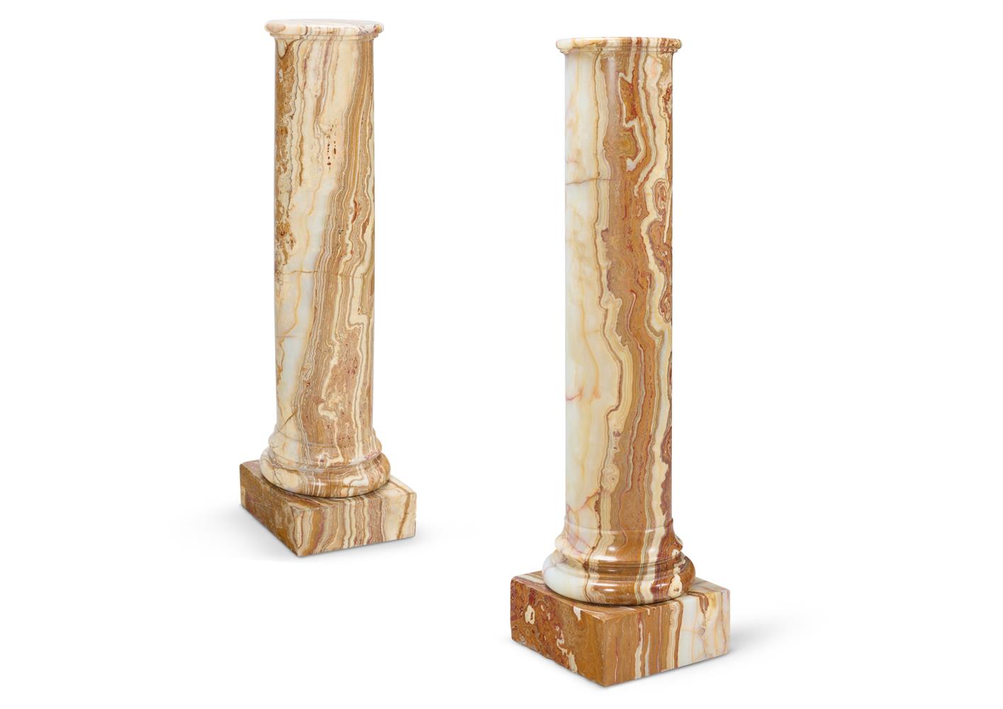 A PAIR OF ALGERIAN ONYX COLUMNS, 20TH CENTURY