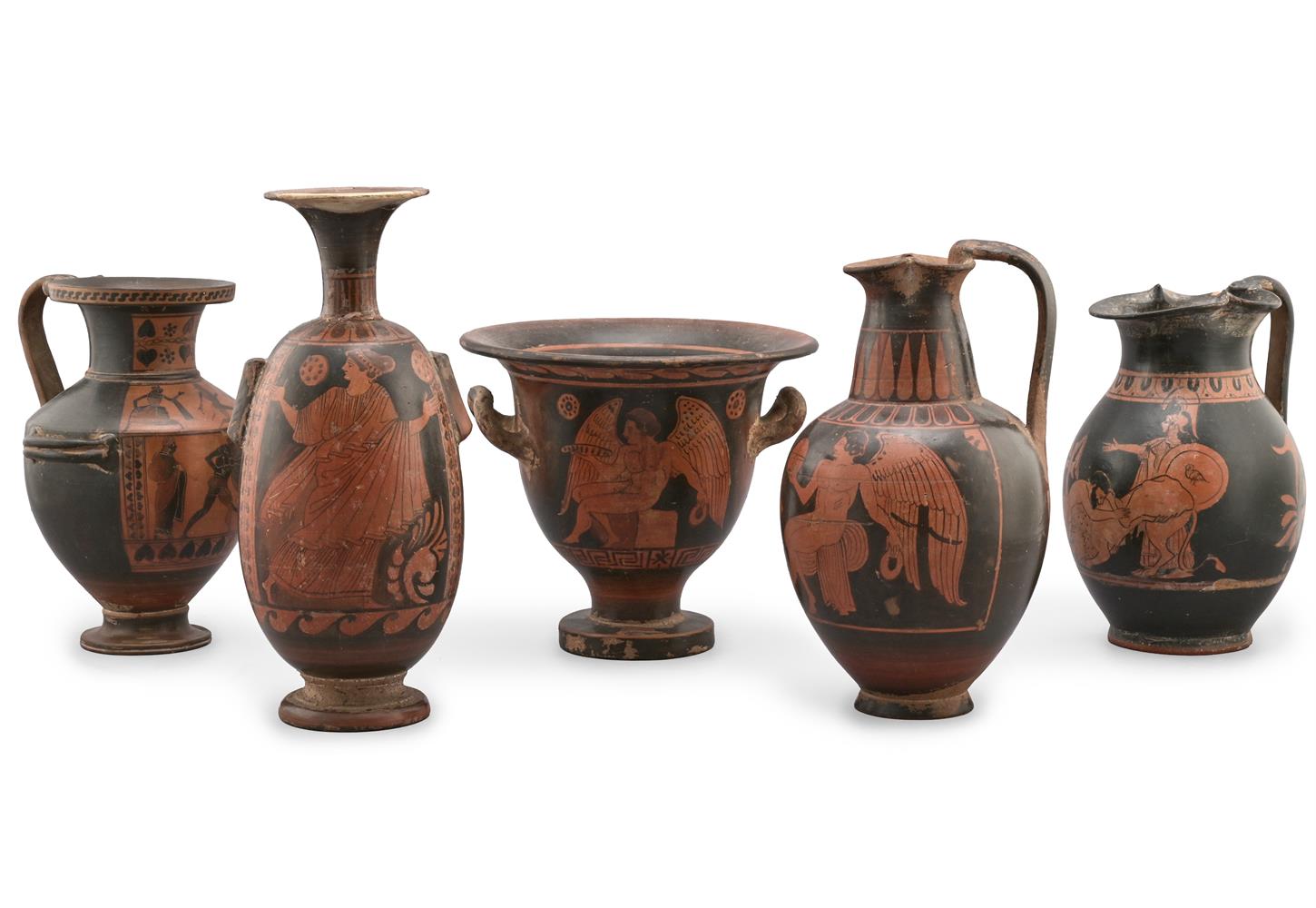 A GROUP OF FIVE COLD PAINTED TERRACOTTA JUGS, URNS AND VASES IN THE ETRUSCAN MANNER