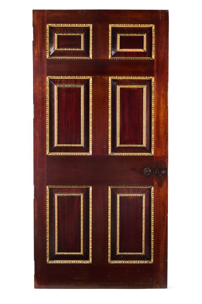 A GEORGE II PARCEL GILT MAHOGANY DOUBLE SIDED PANELLED DOOR, MID 18TH CENTURY