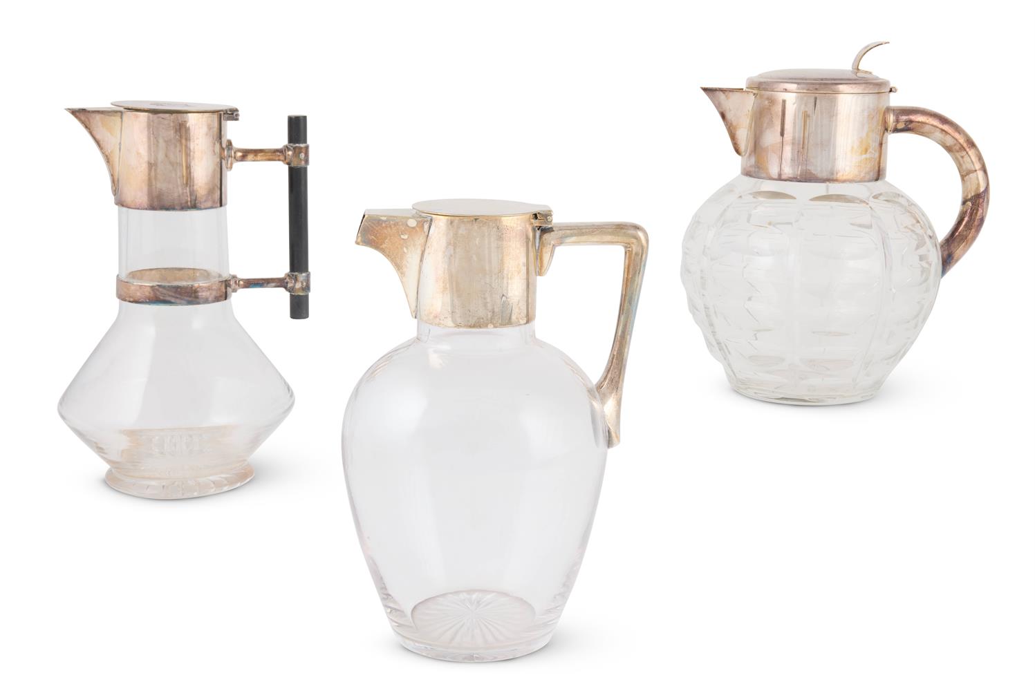 A HUKIN & HEATH SILVER-PLATE MOUNTED GLASS DECANTER, DESIGNED BY CHRISTOPHER DRESSER (1834-1904)