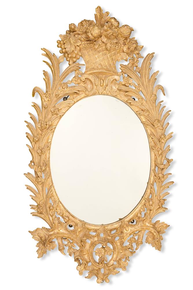 A GEORGE III CARVED GILTWOOD MIRROR, CIRCA 1765