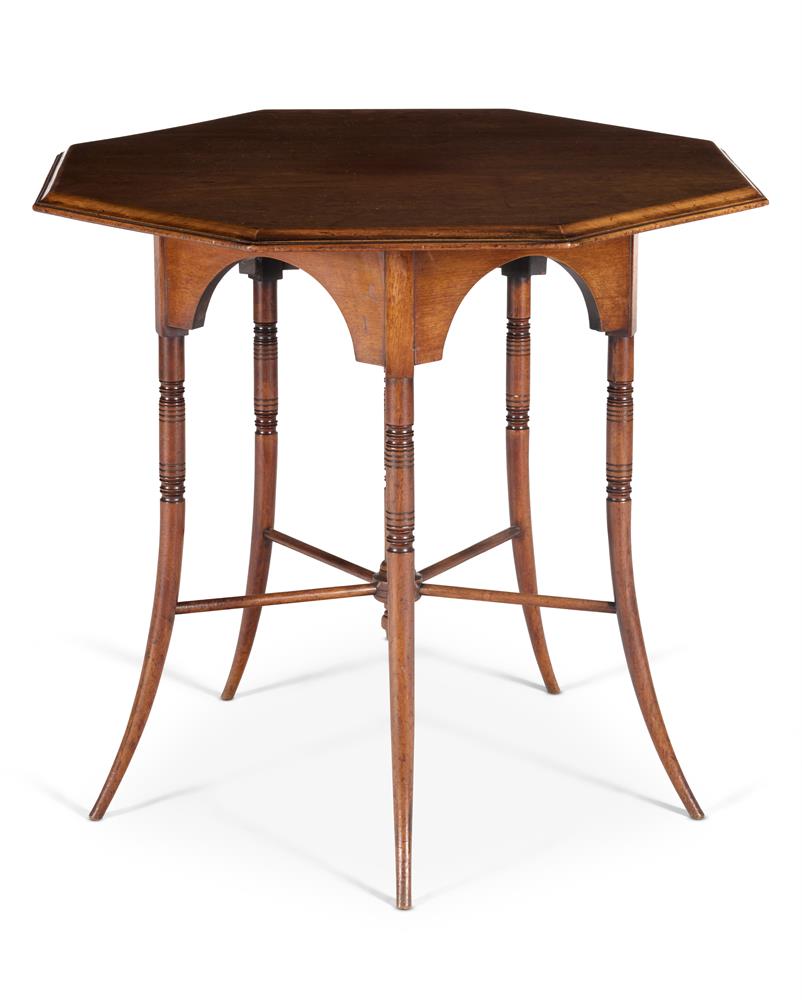 AN OCTAGONAL 'SIX-LEGGED' CENTRE TABLE BY E. W. GODWIN (ENGLISH 1833-1886), CIRCA 1880