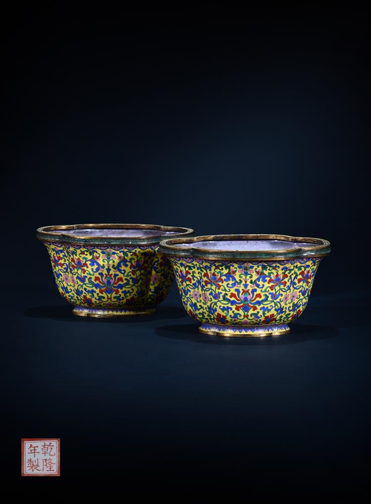 A pair of Chinese yellow ground Canton enamel 'lotus' jardiniers