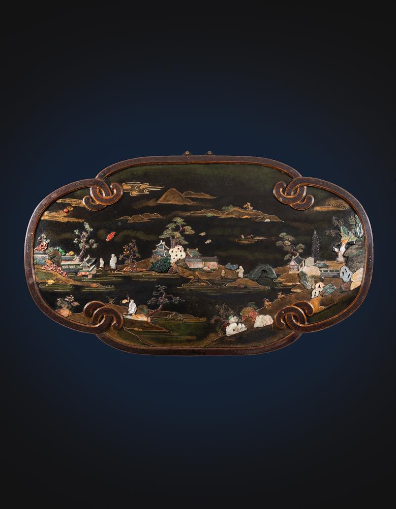A large Chinese inlaid lacquer wall panel