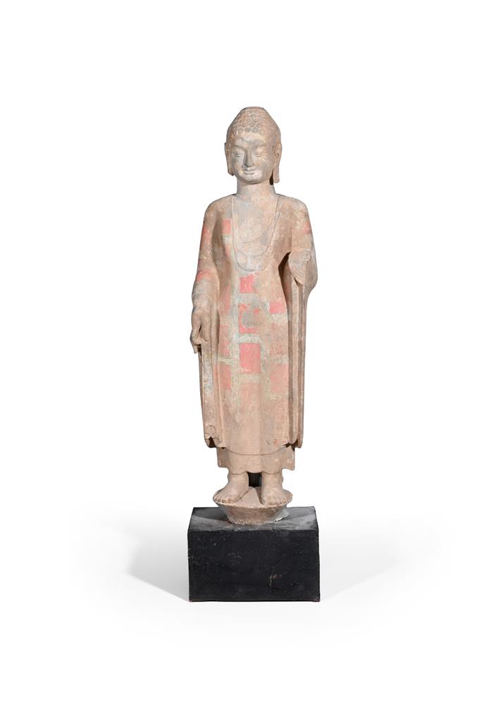 A large Chinese painted limestone standing figure of buddha