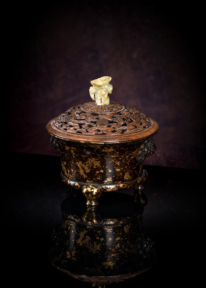 A rare Chinese gilt-splashed bronze tripod censer