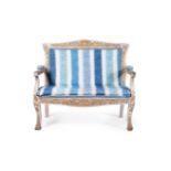 A WHITE PAINTED AND PARCEL GILT SETTEE, NORTH EUROPEAN