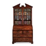A FINE GEORGE III MAHOGANY BUREAU BOOKCASE, IN THE MANNER OF THOMAS CHIPPENDALE, CIRCA 1770