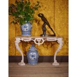A CARVED AND WHITE PAINTED CONSOLE TABLE, LATE 18TH OR 19TH CENTURY