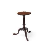 A GEORGE II MAHOGANY PIECRUST CANDLE STAND, IN THE MANNER OF THOMAS CHIPPENDALE, CIRCA 1750