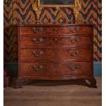 A FINE GEORGE III MAHOGANY SERPENTINE FRONTED COMMODE, CIRCA 1760