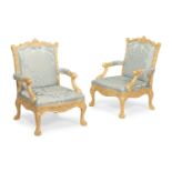 A PAIR OF CARVED GILTWOOD AND UPHOLSTERED LIBRARY ARMCHAIRS, IN GEORGE III STYLE, CONTEMPORARY