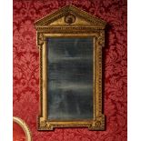 A GEORGE III CARVED GILTWOOD AND GESSO ARCHITECTURAL MIRROR, CIRCA 1760