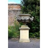 A LARGE COMPOSITION STONE LION MASK URN ON STAND, LATE 20TH CENTURY