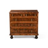 A WILLIAM & MARY OLIVEWOOD OYSTER VENEERED, LABURNUM AND WALNUT CHEST OF DRAWERS, CIRCA 1690