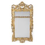 A GEORGE III CARVED GILTWOOD MIRROR, IN THE MANNER OF THOMAS CHIPPENDALE, CIRCA 1770