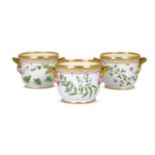 A SET OF THREE ROYAL COPENHAGEN FLORA DANICA PORCELAIN CACHE POTS OR PLANTERS